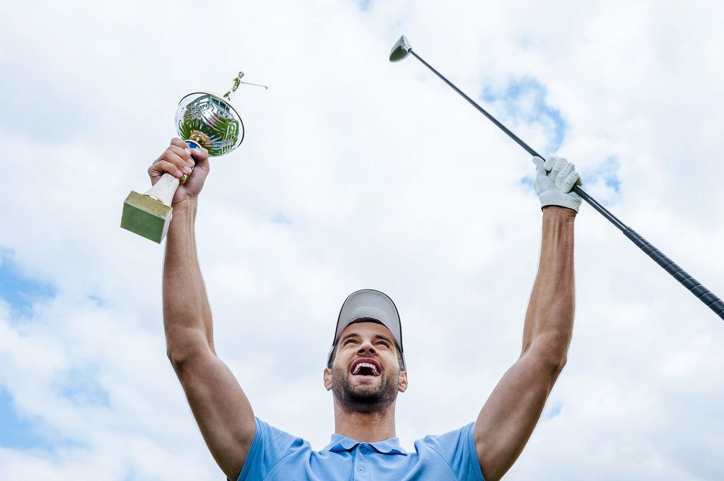 golf-tournament-winner-with-trophy