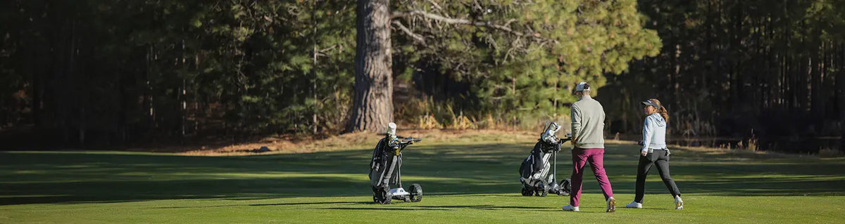 Golfers walking freely down the fairway