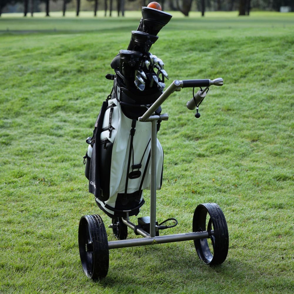 Rear view of the Galaxy Titan electric golf cart on the course, showcasing dual motors and sturdy wheel design for this high-tech motorized golf cart.