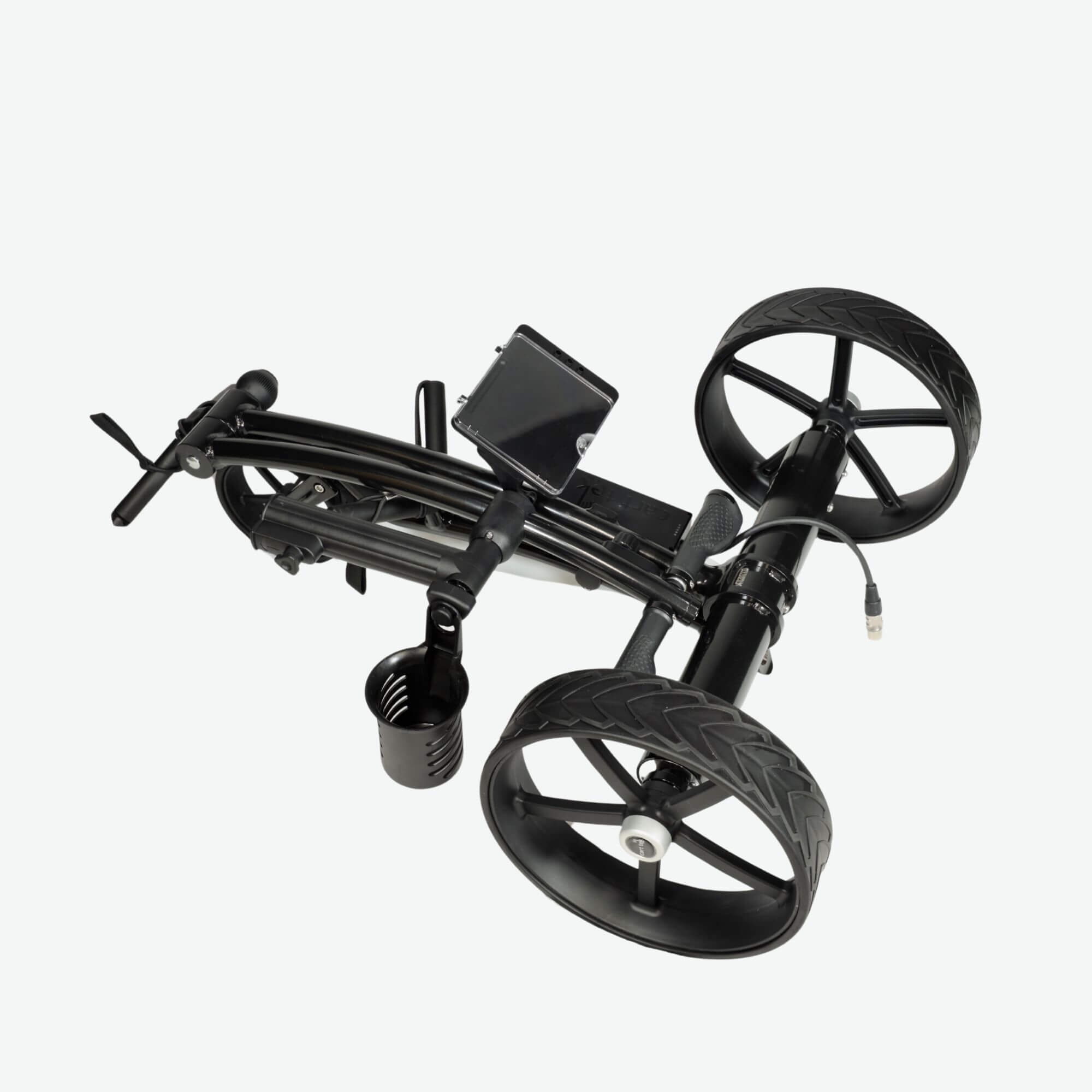 GRi-975Li black electric golf push cart with downhill braking, shown in its folded position. This compact and lightweight electric golf push cart features a space-saving design, making it easy to transport and store. Equipped with a rechargeable lithium battery and advanced braking system, it offers effortless maneuverability on the course.