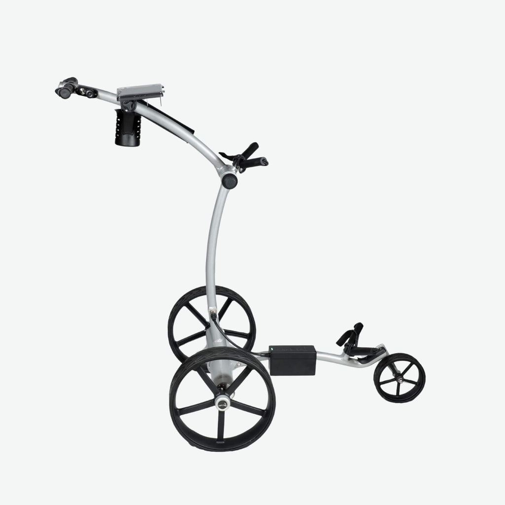 Right-side profile of the GRi-975Li Silver electric golf push cart with downhill braking, showcasing its sturdy frame, ergonomic handle, and durable wheels designed for smooth navigation on the course.