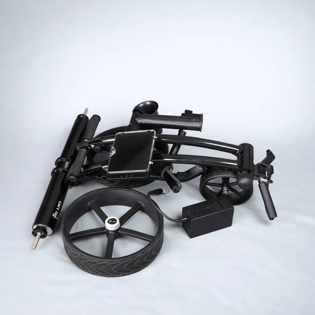 GRi-975Li electric golf trolley folded with components shown, including removed wheel and parts for transport or assembly