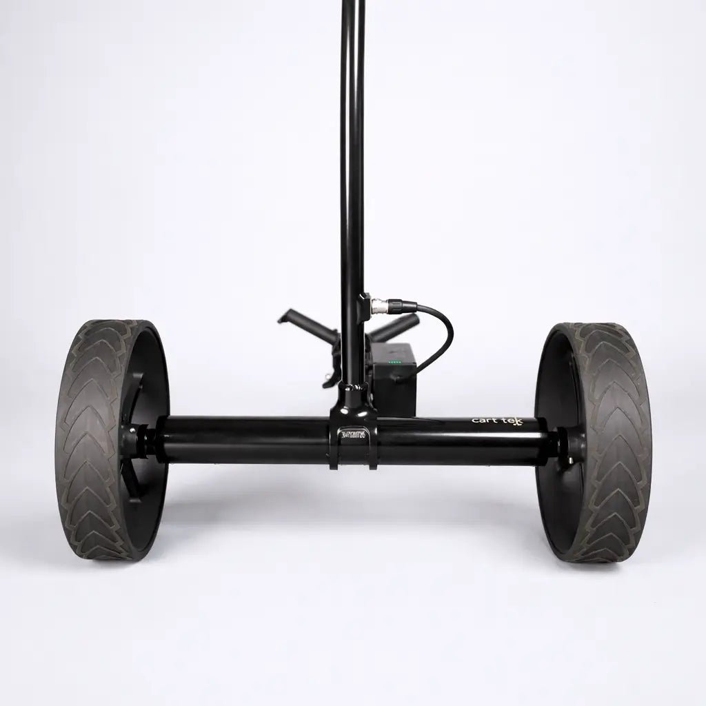 Rear axle and wheel close-up of the GRi-975Li electric golf trolley, showing the wide wheels and dual motor drive setup