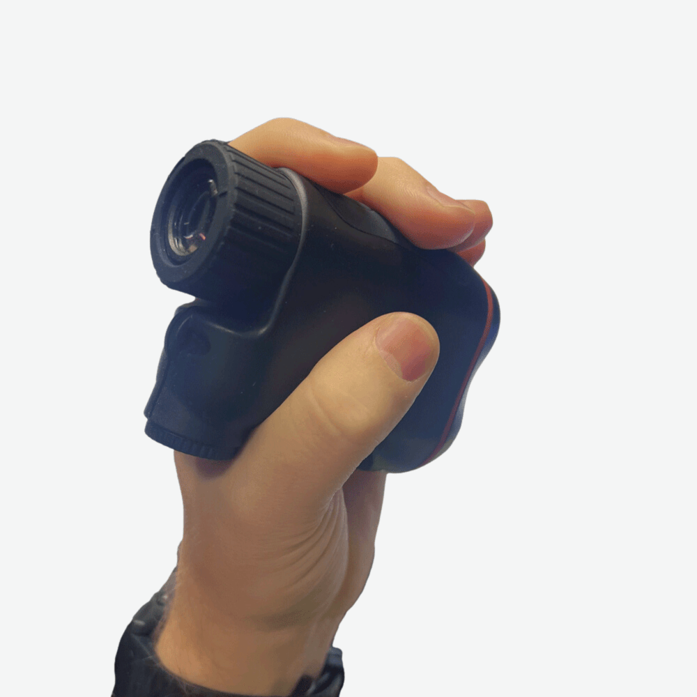 Kaemeasu range finder in hand on white background